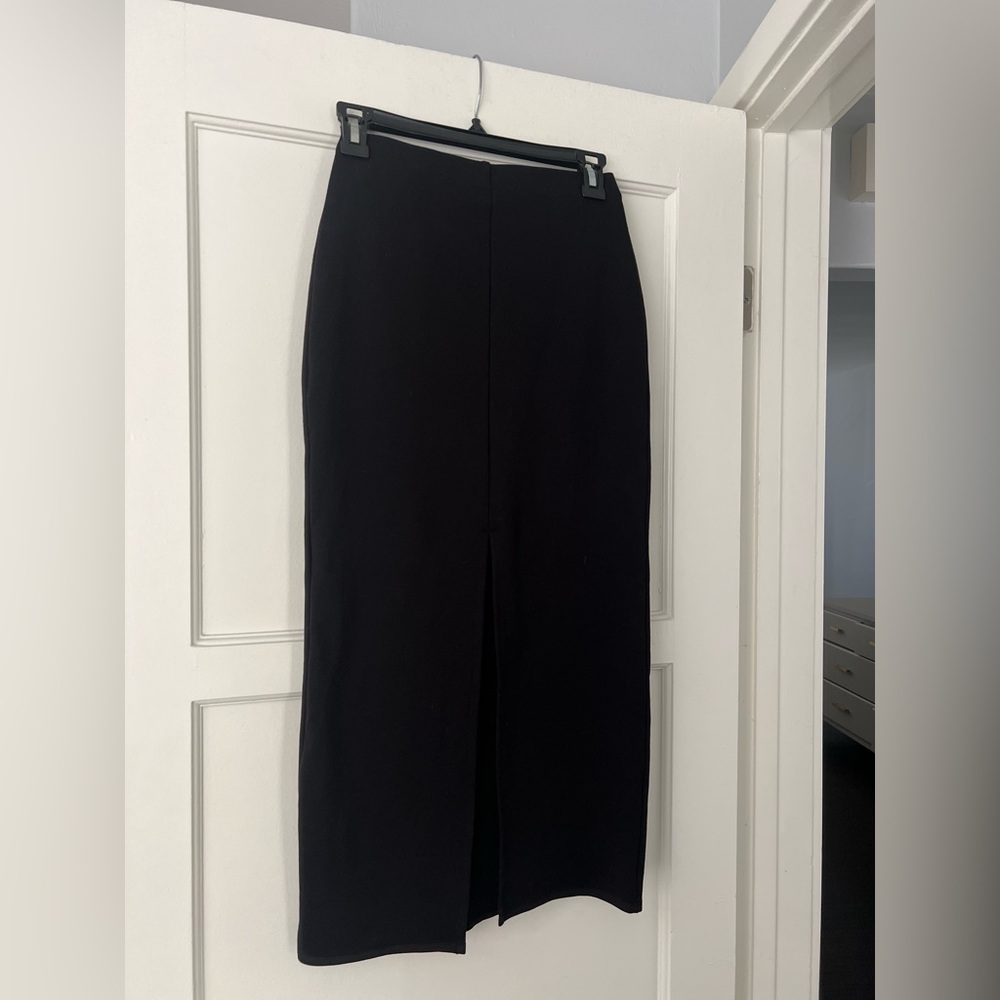 Mango, black skirt with front slit. Midi length size 1